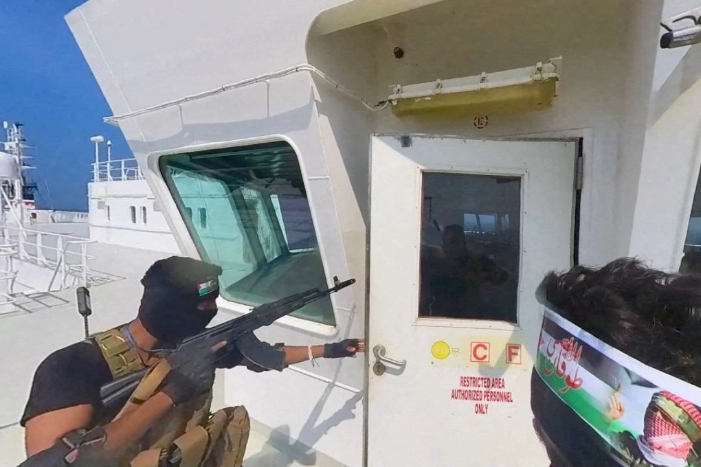 A Houthi fighter on a ship’s deck in the Red Sea. Photo: Houthi Military Media / Handout via Reuters
