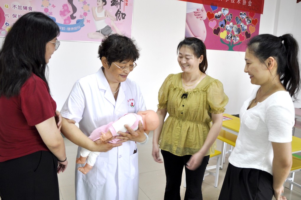 Expectant mothers, likely to be parents to babies born in the Year of the Dragon, attend a breastfeeding class in Zaozhuang, Shandong province, China, in August 2023. Chinese parents believe “dragon babies” are luckier and higher achieving than children born under other zodiac signs. Photo: Getty Images