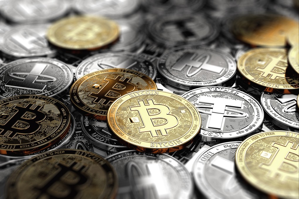 Representations of bitcoin and tether tokens in a 3D rendering. Hong Kong’s proposed stablecoin regulation opens the question of whether the world’s largest issuer of such tokens, Tether, will seek a licence in the city where it was founded. Photo: Shutterstock