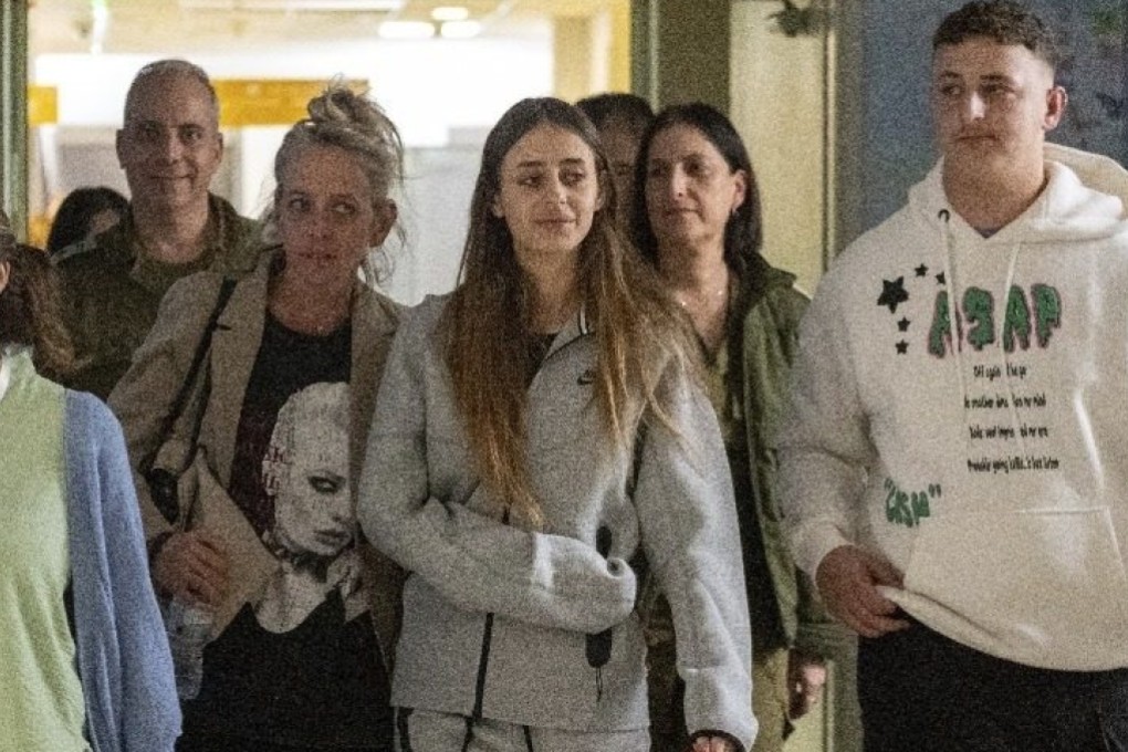 Released French-Israeli hostage Mia Shem, centre, is reunited with her family at Sheba Medical Center in Tel Hashomer, Ramat Gan, Israel on November 30. Photo: GPO via AP