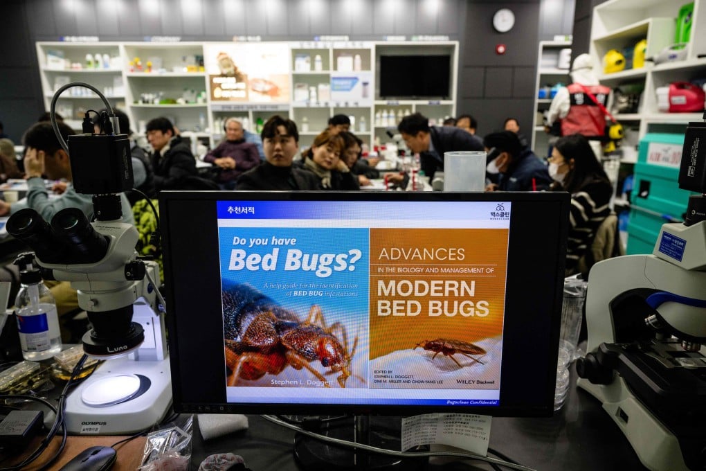 People attend a lecture on bedbug control in Seoul, South Korea. Photo: AFP