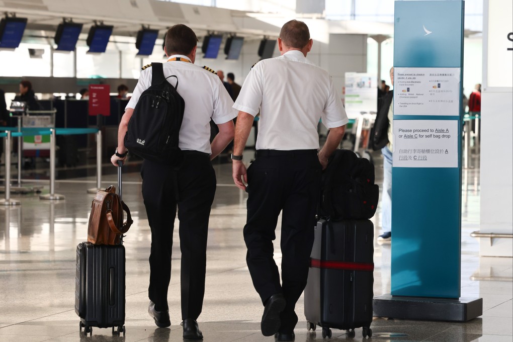 Cathay Pacific pilots. Cockpit crew tell the Post that the problem of flight cancellations might persist because of the shortage of experienced staff. Photo: Dickson Lee