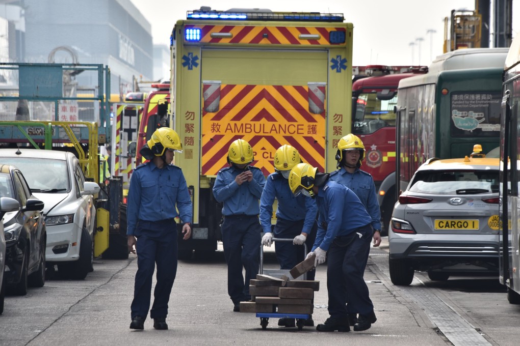 An ambulance arrives at the scene of an accident where a worker died after being trapped by an elevating platform near Hong Kong International Airport on Thursday. Photo: Handout