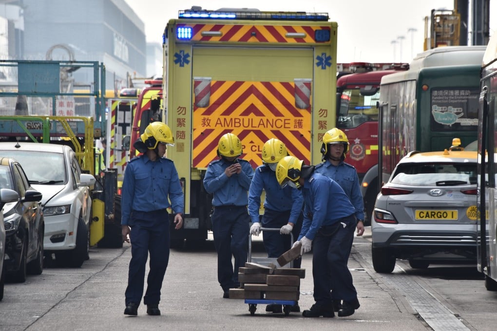 An ambulance arrives at the scene of an accident where a worker died after being trapped by an elevating platform near Hong Kong International Airport on Thursday. Photo: Handout