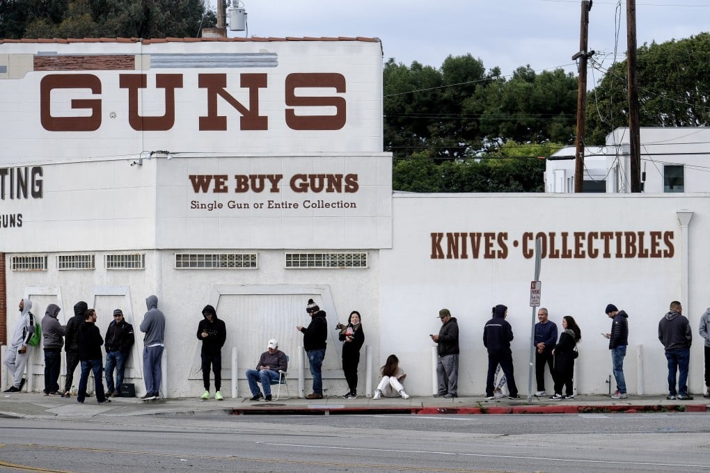 People wait to enter a gun shop in Culver City, California. On Saturday, a federal appeal court cleared the way for a California law that bans the carrying of guns in most public places to take effect at the start of 2024. Photo: AP