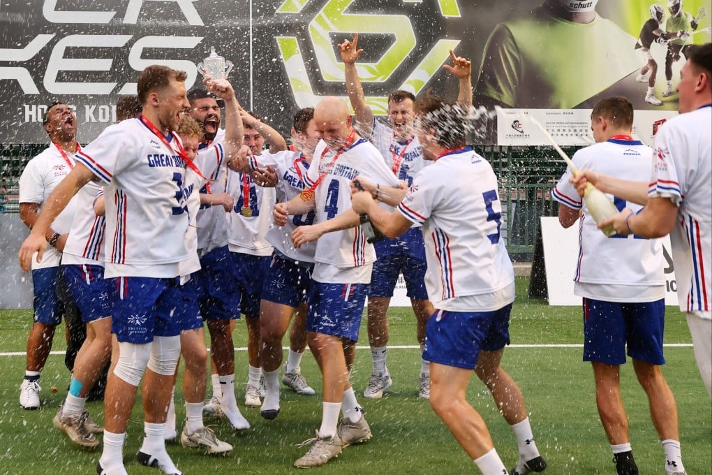 Great Britain’s men celebrate winning their tournament at the World Lacrosse Super Sixes in Hong Kong. Photo: Dickson Lee