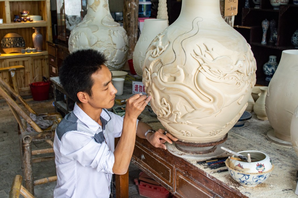 A craftsman working in China’s “porcelain capital”, Jingdezhen in Jiangxi province. Jingdezhen has been attracting a rising number of visitors as cultural tourism grows in China. Photo: Shutterstock