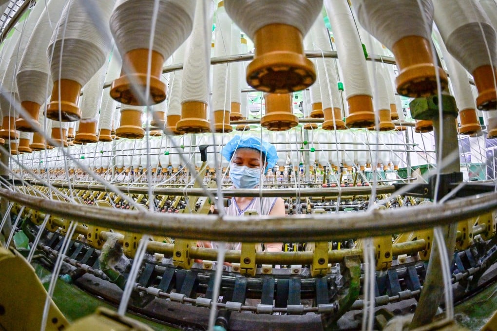 A worker in a production workshop located in Qingzhou Economic Development Zone, Shandong Province, China. Photo: Xinhua