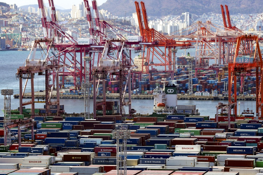 Containers are seen at South Korea’s largest port in Busan. The nation’s exports picked up in December. Photo: Yonhap via AP