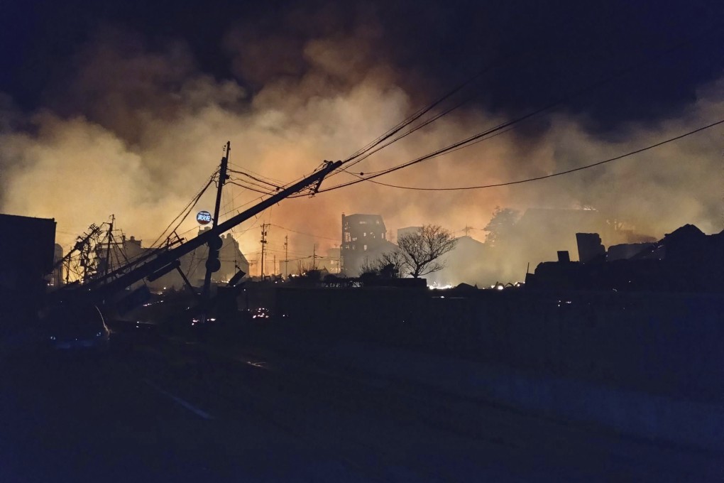 Smoke rises on Tuesday morning from the site of a fire that broke out in Wajima, Japan’s Ishikawa prefecture, following the earthquake. Photo: AP