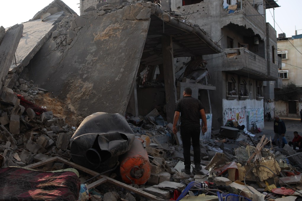 A man checks on a house destroyed after an Israeli airstrike in Maghazi refugee camp in central Gaza Strip on Monday. Photo: Xinhua