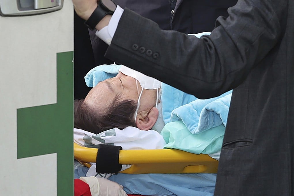 South Korean opposition leader Lee Jae-myung arrives on a stretcher arrives at a hospital in Seoul on Tuesday. Photo: Yonhap via AP
