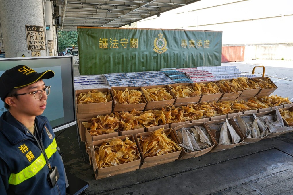 Customs displays the goods seized during the operation. The smuggled items were destined for Vietnam, according to the department. Photo: Elson Li