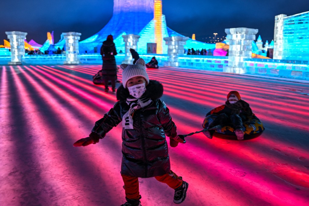 Children play at the Harbin Ice and Snow World in Harbin during the opening ceremony of the 39th Harbin China International Ice and Snow Festival on January 5, 2023. To reignite its tourist appeal, Hong Kong could take lessons from the mainland Chinese city. Photo: AFP