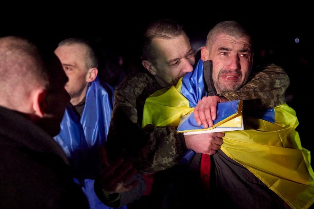 Ukrainian prisoners of war after their release. Photo:  Ukrainian Presidential Press Service via Reuters