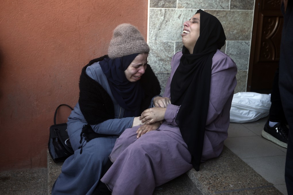 Palestinians mourn relatives killed in an Israeli strike, outside a morgue in Khan Younis, Gaza on Thursday. Photo: AP