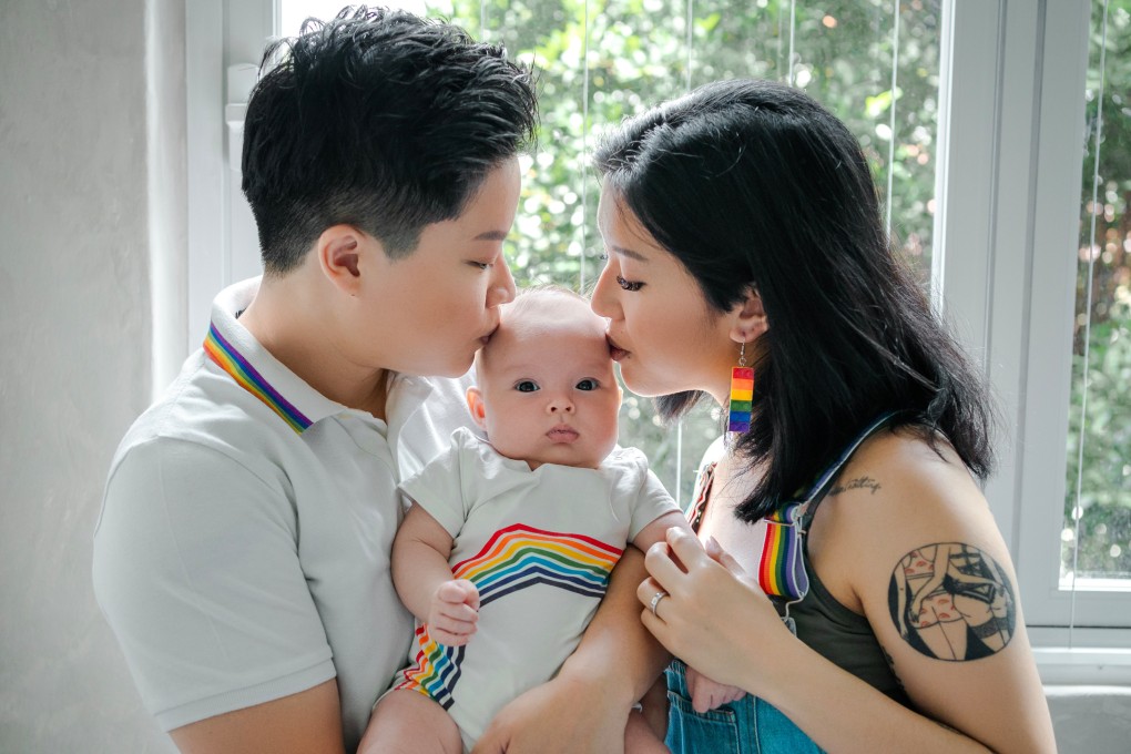 Cally Chia (right) and wife Ching Chia pictured with their daughter. Photo: Handout/Cally Chia
