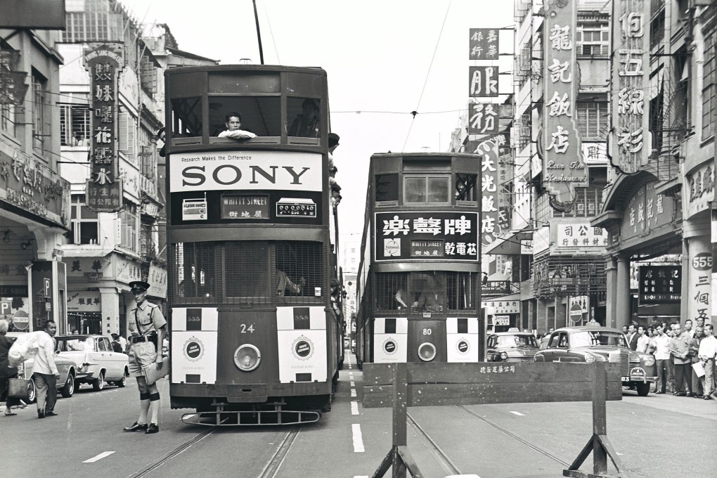 Trams on Hong Kong’s Des Voeux Road Central in the 1960s. The road was the scene of an exchange of fire between police and armed robbers in January 1963. Photo: SCMP