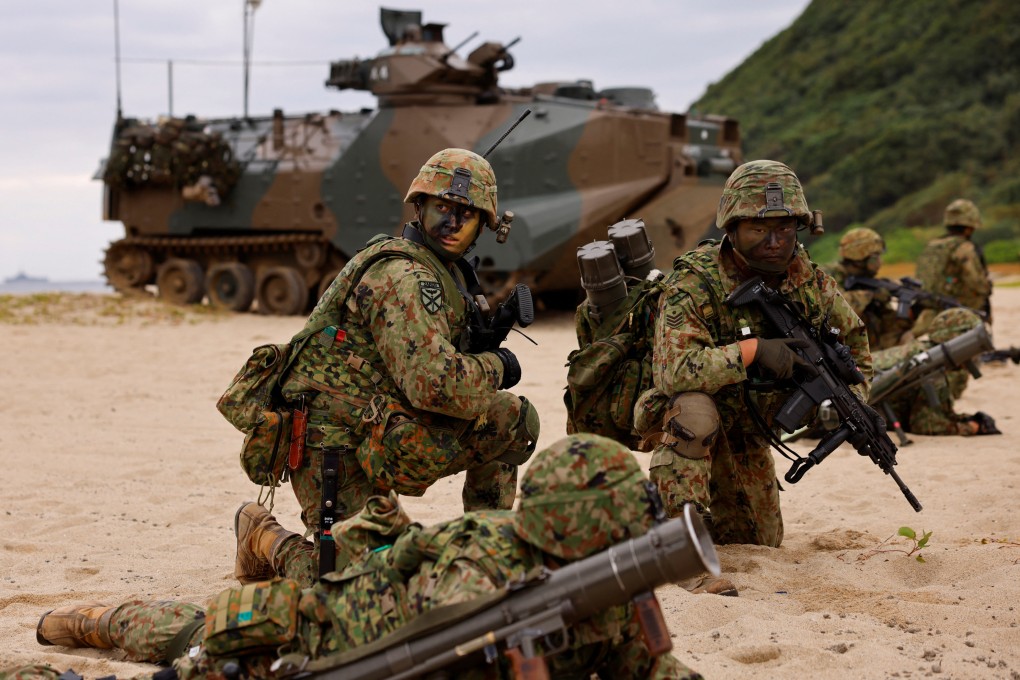 Japanese soldiers from the Amphibious Rapid Deployment Brigade take part in a marine landing drill on Tokunoshima island in November. Photo: Reuters