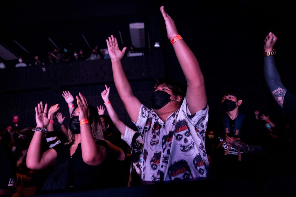 People attend a concert in Bangkok by Thai metal band Defying Decay in 2022. Photo: AFP