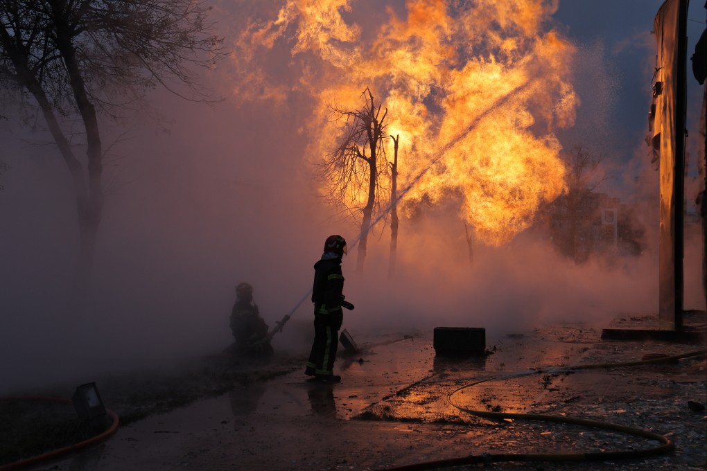 Firefighters work to suppress a fire at a pipeline in Ukraine’s Podilskyi district caused by falling rocket debris as a result of a Russian missile attack. Photo: Ukrinform / dpa