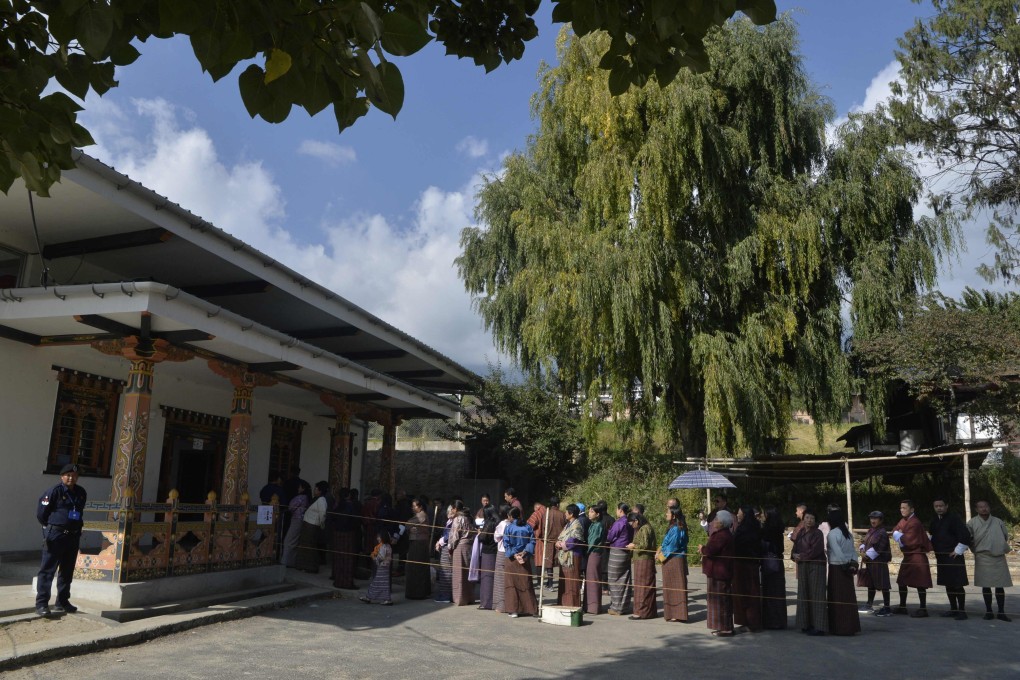 People line up to vote at a polling station in Thimphu, Bhutan. File photo: AFP