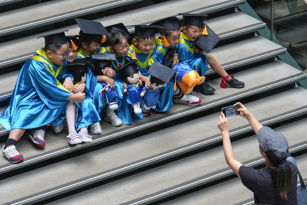 Kindergarten graduates pose for photos in Tsuen Wan. Non-profit-making kindergartens account for three-quarters of the preschools in the city. Photo: Sam Tsang