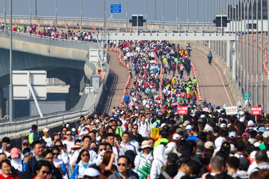 About 11,000 people walk along the Hong Kong-Zhuhai-Macau Bridge for the charity event on Sunday. Photo: Dickson Lee