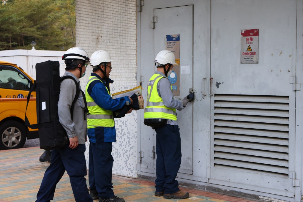 CLP staff inspect power facilities for On Mei House. Photo: Dickson Lee
