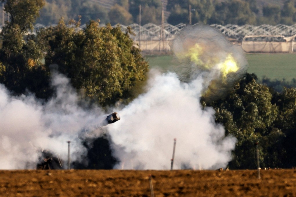 An Israeli artillery unit fires near the Gaza border on Saturday. Photo: Reuters