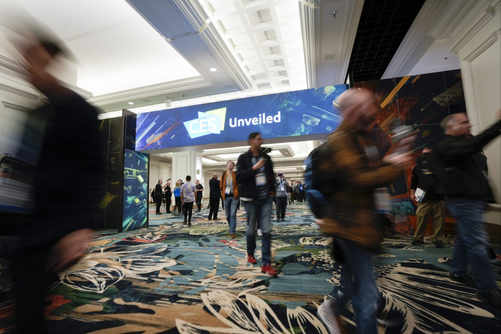 Attendees arrive at the CES Unveiled event before the start of the CES tech show, January 7, 2024, in Las Vegas. Photo: AP