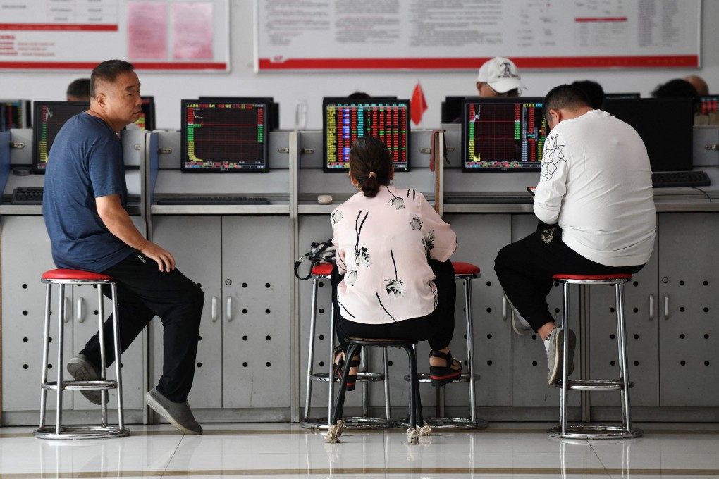 A securities company in China’s eastern Anhui province. Wind has more than 300,000 terminal users, including all of China’s asset management firms, 85 per cent of its domestic brokerages and 75 per cent of the qualified foreign institutional investors that invest in Chinese stocks, according to the firm. Photo: AFP