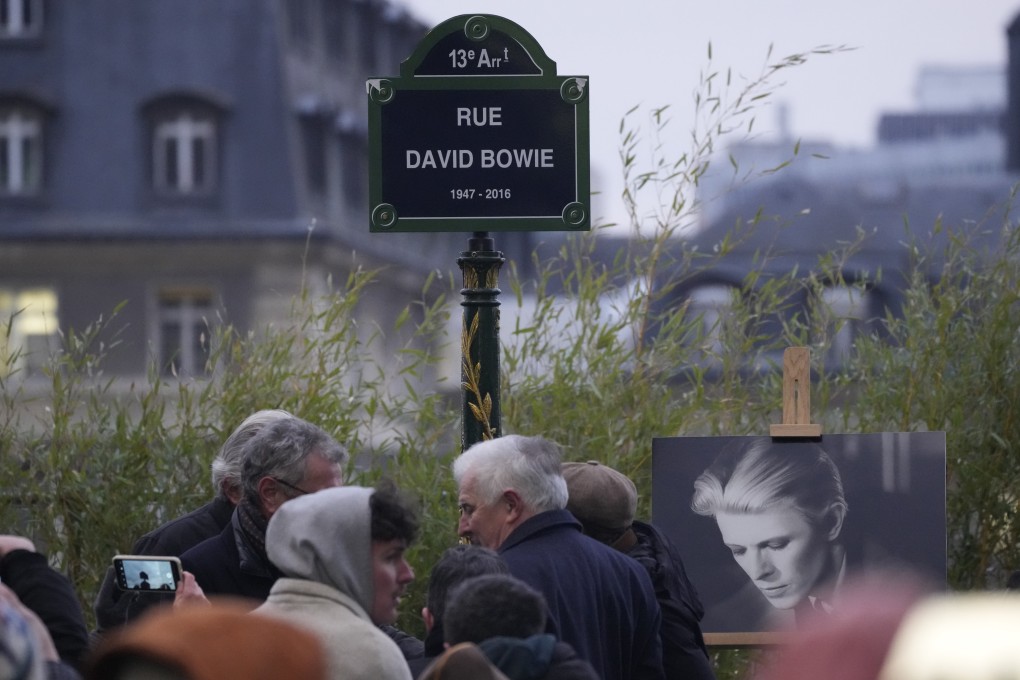 The street sign commemorating singer David Bowie after an unveiling ceremony in Paris on Monday. Photo: AP