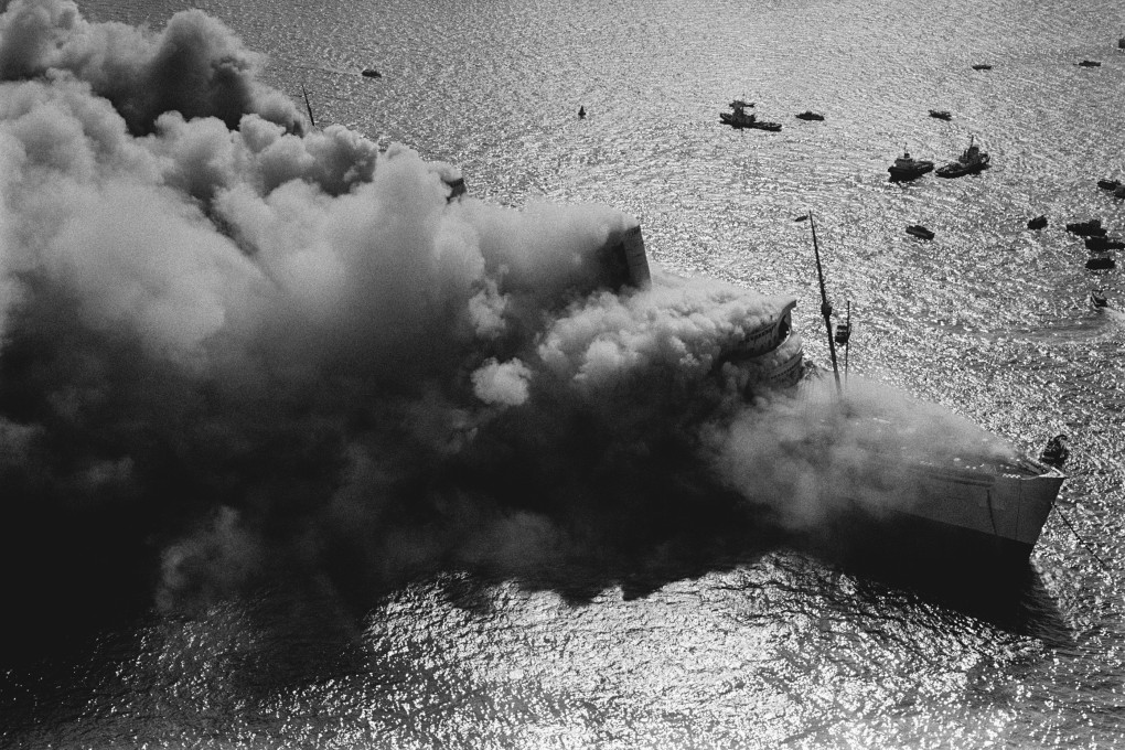 Fire and smoke engulf the former luxury liner Queen Elizabeth in Hong Kong’s Victoria Harbour on January 9, 1972. Photo: R Tam