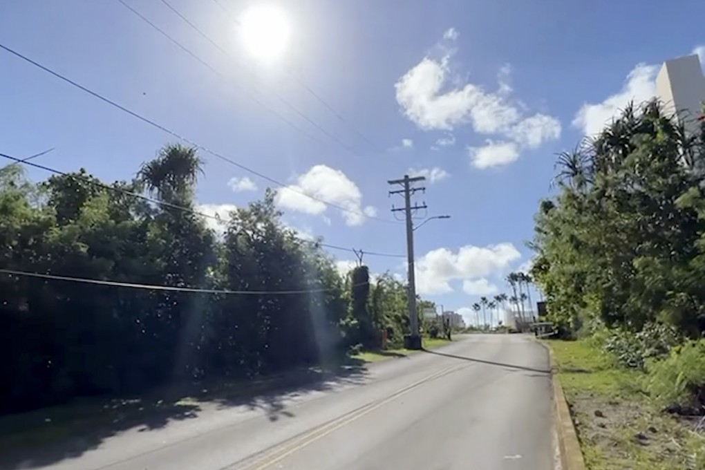 A South Korean tourist was fatally shot near Tsubaki Towers (right) in Tamuning, Guam. Photo: KUAM-TV via AP