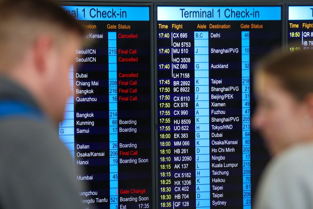 Check-in boards at Hong Kong International Airport. Cathay Pacific has admitted it underestimated the number of pilots needed to cover the recent holiday period. Photo: Xiaomei Chen