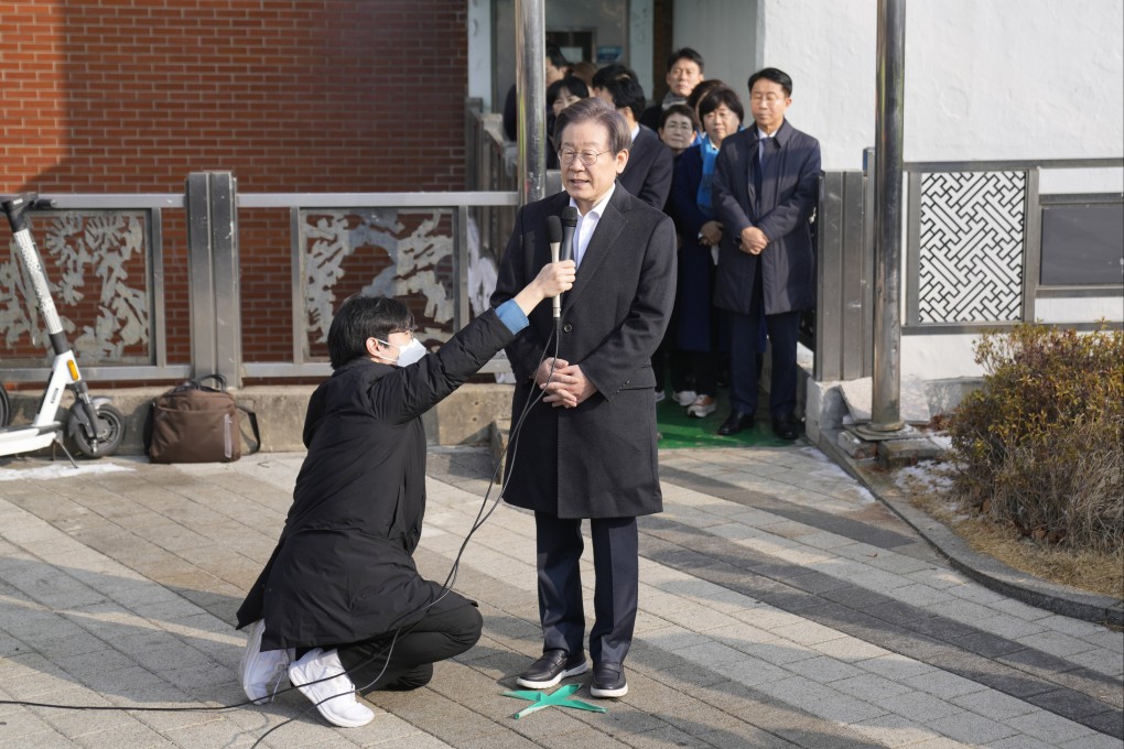 South Korean opposition leader Lee Jae-myung speaks as he leaves a hospital in Seoul on Wednesday. Photo: AP