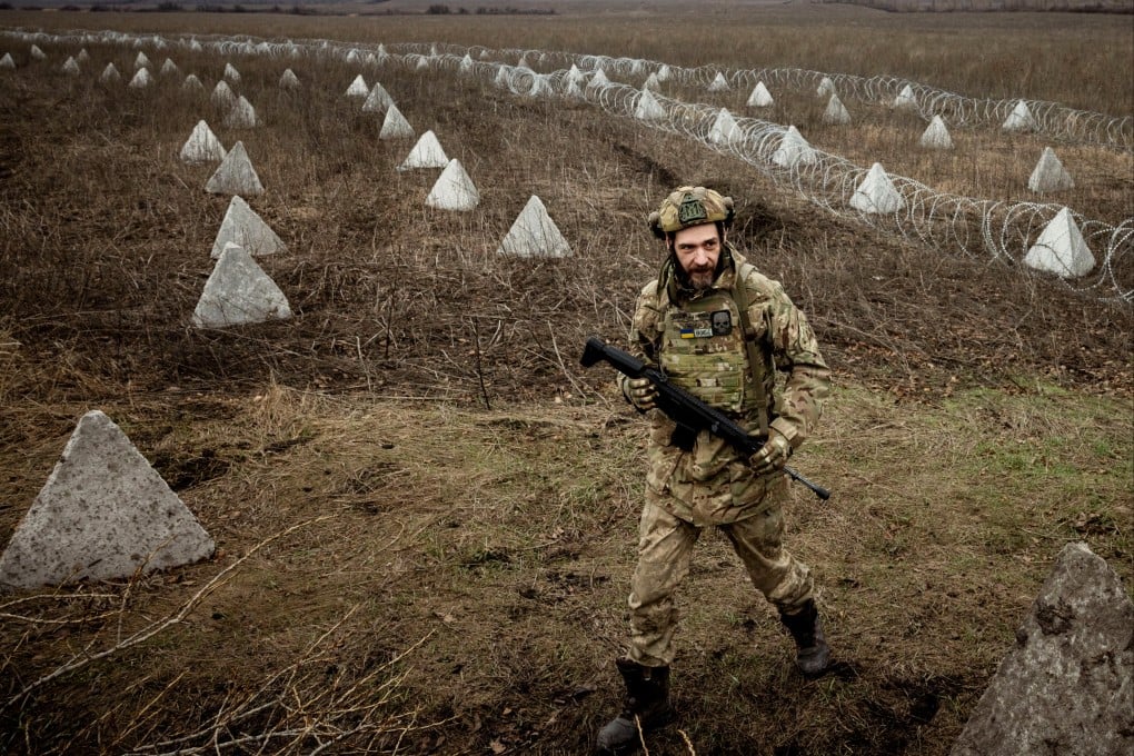 Fortifications, including ‘dragon’s teeth’ and barbed wire, near the front line outside Kupiansk, Ukraine. Photo: Reuters