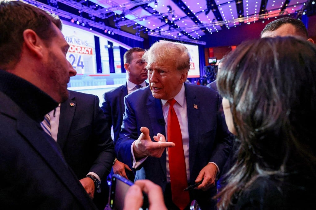Republican presidential candidate Donald Trump interacts with supporters after participating in a Fox News Channel town hall ahead of the caucus in Des Moines, Iowa, on January 10. Photo: Reuters