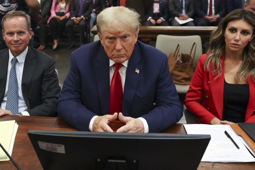 Former US president Donald Trump appears in the courtroom with his lawyers for his civil fraud trial in New York in October. Photo: TNS