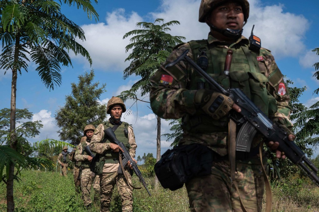 Members of the Mandalay People’s Defence Forces patrolling near the frontline amid clashes with Myanmar’s military in northern Shan State. Photo: AFP