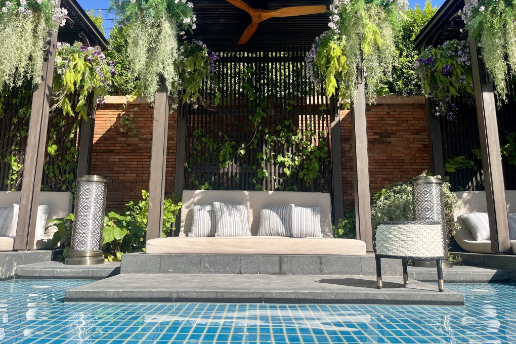 During a stay at the InterContinental Chiang Mai The Mae Ping in Thailand, you can relax by the pool (above), enjoy a Thai massage, sip a cocktail or visit the city and its temples. Photo: Kylie Knott