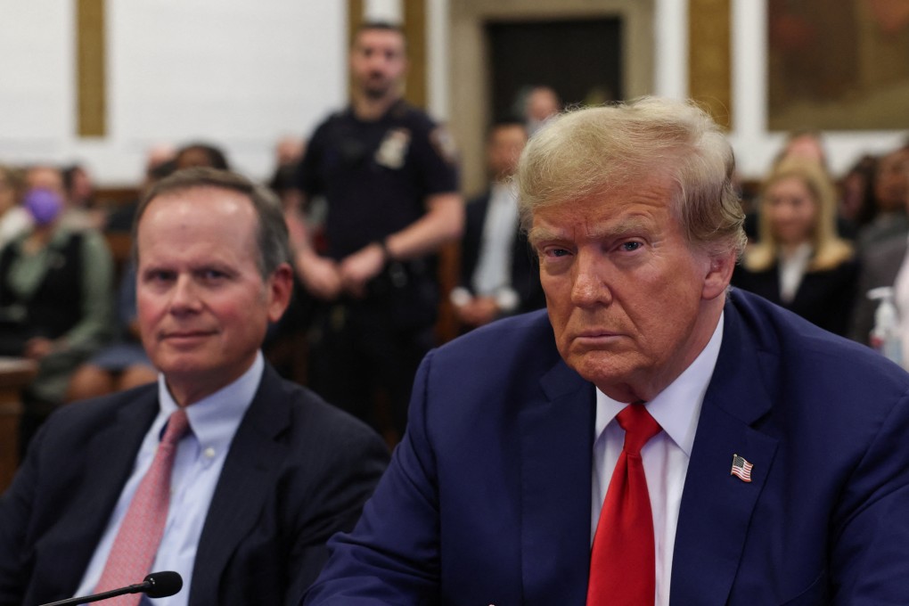 Former US president Donald Trump and lawyer Christopher Kise attend the closing arguments in the Trump Organization civil fraud trial in New York on Thursday. Photo: Reuters