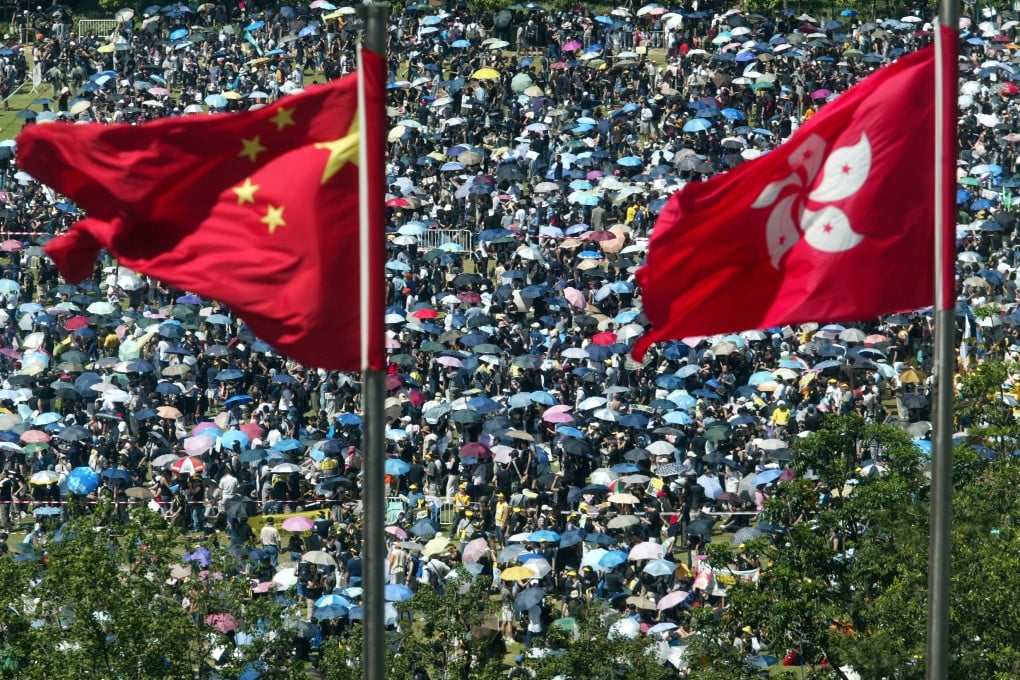 Residents march from Victoria Park in Causeway Bay to the Central Government Offices in Admiralty in protest over the proposed Hong Kong national security legislation in 2003. Photo: Martin Chan