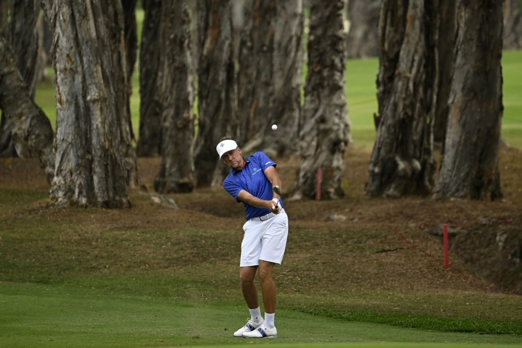 Ian Poulter hits an approach during the second round of the World City Championship at Hong Kong Golf Club. Photo: Asian Tour