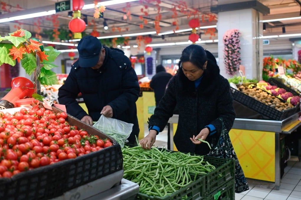 China’s consumer price index (CPI) fell by 0.3 per cent year on year in December, the National Bureau of Statistics said on Friday. Photo: AFP