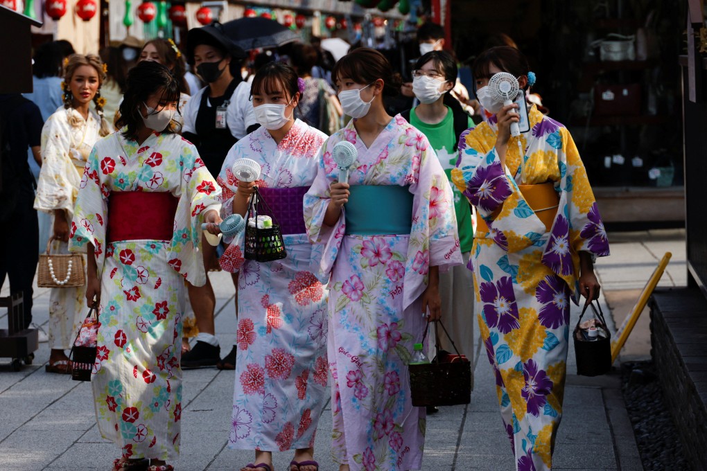 Women wearing kimonos at the Asakusa district in Tokyo on June 29, 2022. Photo: Reuters