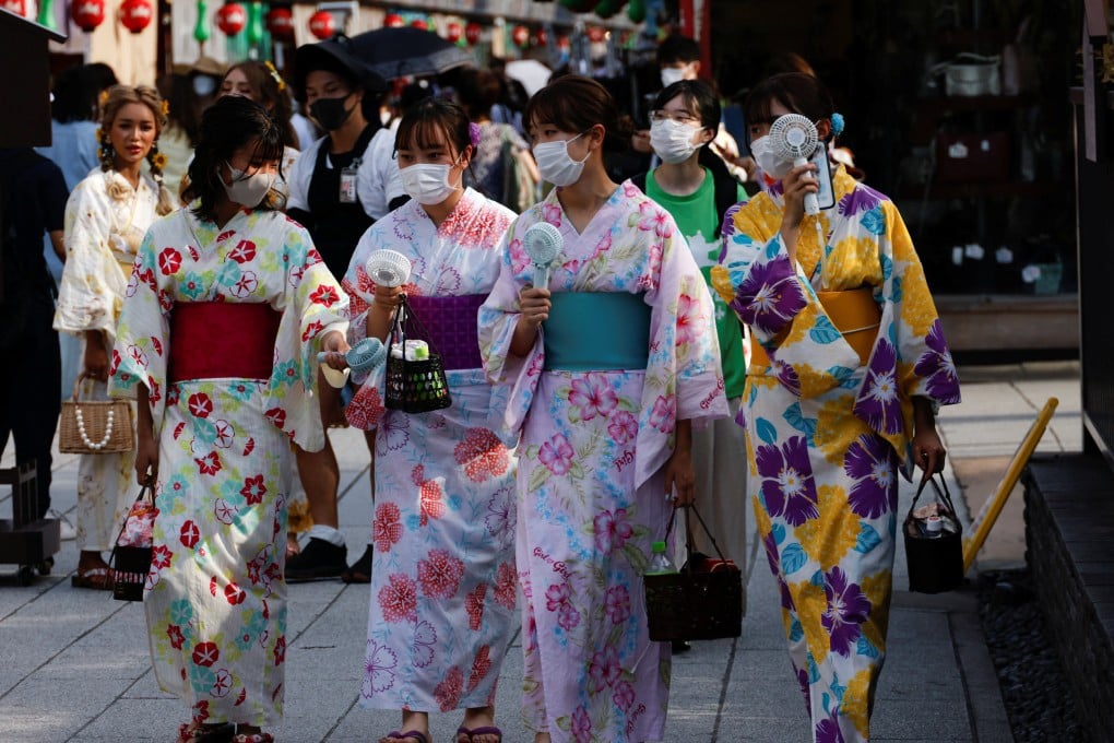 Women wearing kimonos at the Asakusa district in Tokyo on June 29, 2022. Photo: Reuters