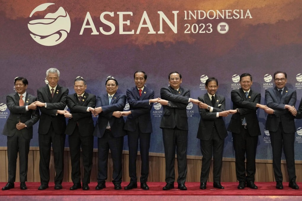 Asean leaders shake hands for a family photo before a summit session in Jakarta, Indonesia, in September last year. Photo: AP