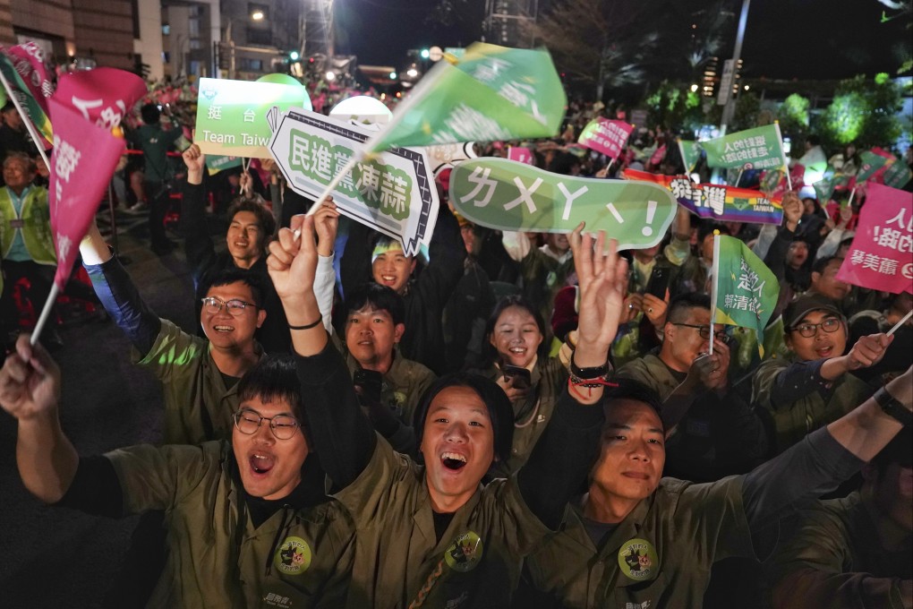 DPP supporters cheer outside the party’s headquarters as it becomes apparent that William Lai had won the presidential race. Photo: SCMP